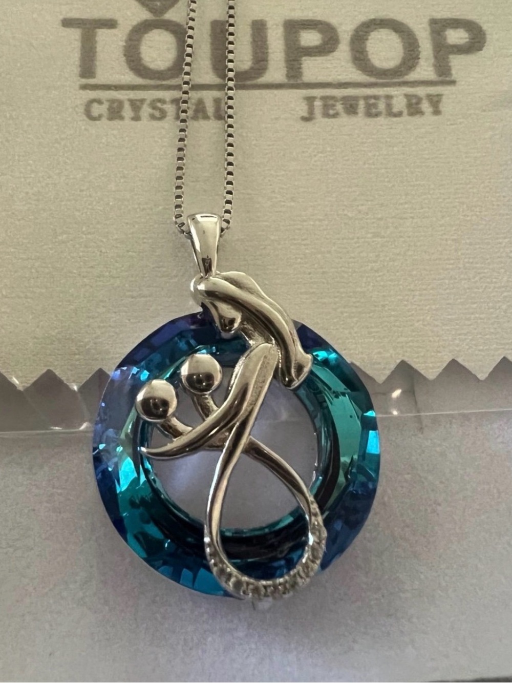 Sterling Silver-Tone Infinity Pendant Necklace with Blue Crystal Ring